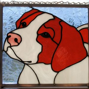 stained glass suncatcher of a brittany spaniel dog