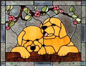 two-yellow-puppies